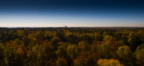 Fall foliage in North Georgia with Johns Creek water towers in background